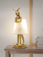 Antique Gold Bunny Table Lamp With White Linen Shade
